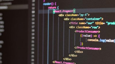 Close-up of HTML and JavaScript code on a computer screen in Visual Studio Code.